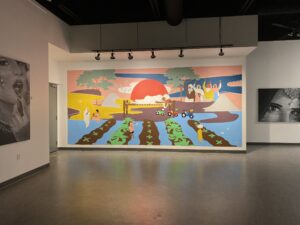 Kisaan's Fight is a mural painted by Kiran Rai-Bhullar at The Hub Gallery, in Canmore. This was part of a larger solo exhibition "Maharani Mentality" and reflects the fight for farmers rights and freedoms.