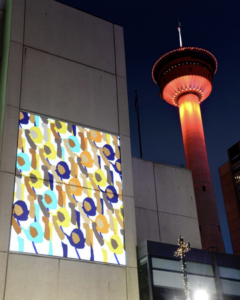 Long Live Women Farmers, projected and displayed on the Glenbow Museum as part of Project Projekt at the Chinook Blast Festival
